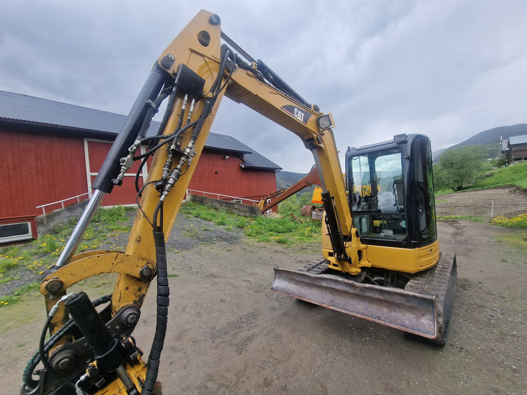 Mini Pelle Cat 304C CR + Godet rotor basculant
