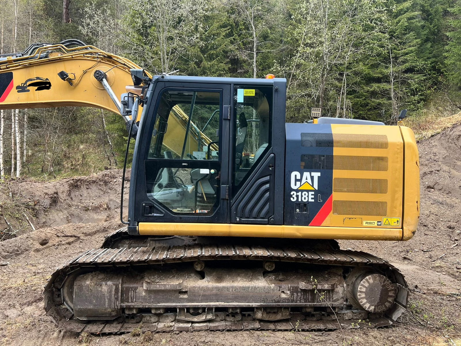 Pelle Cat 318E