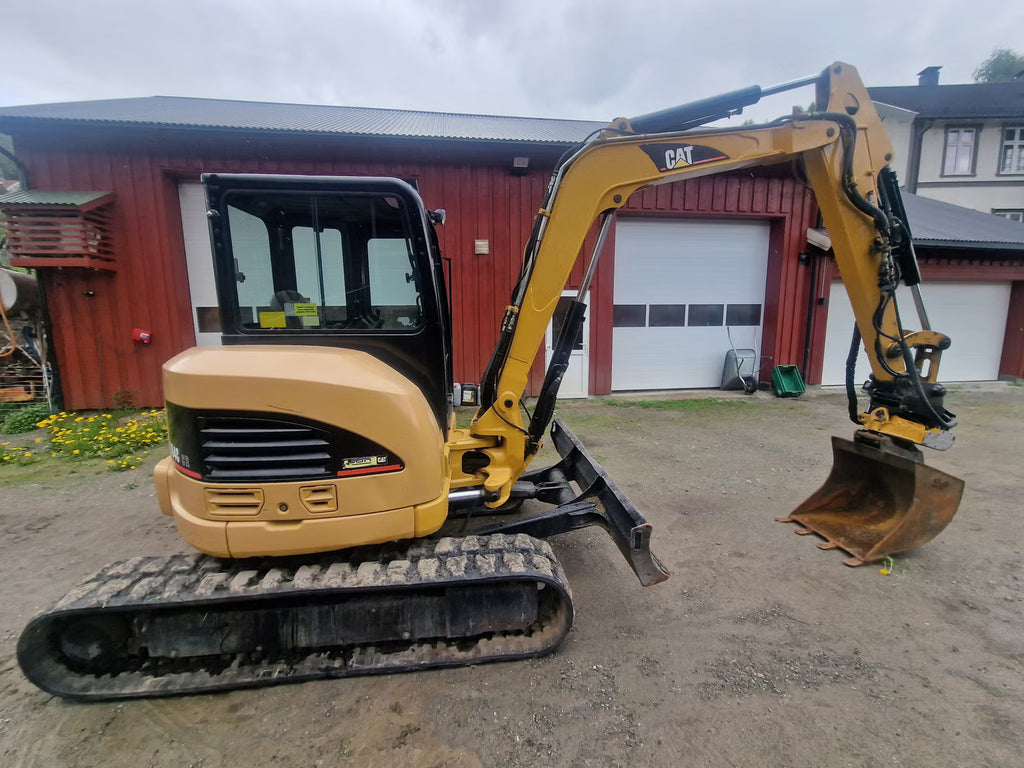 Mini Pelle Cat 304C CR + Godet rotor basculant