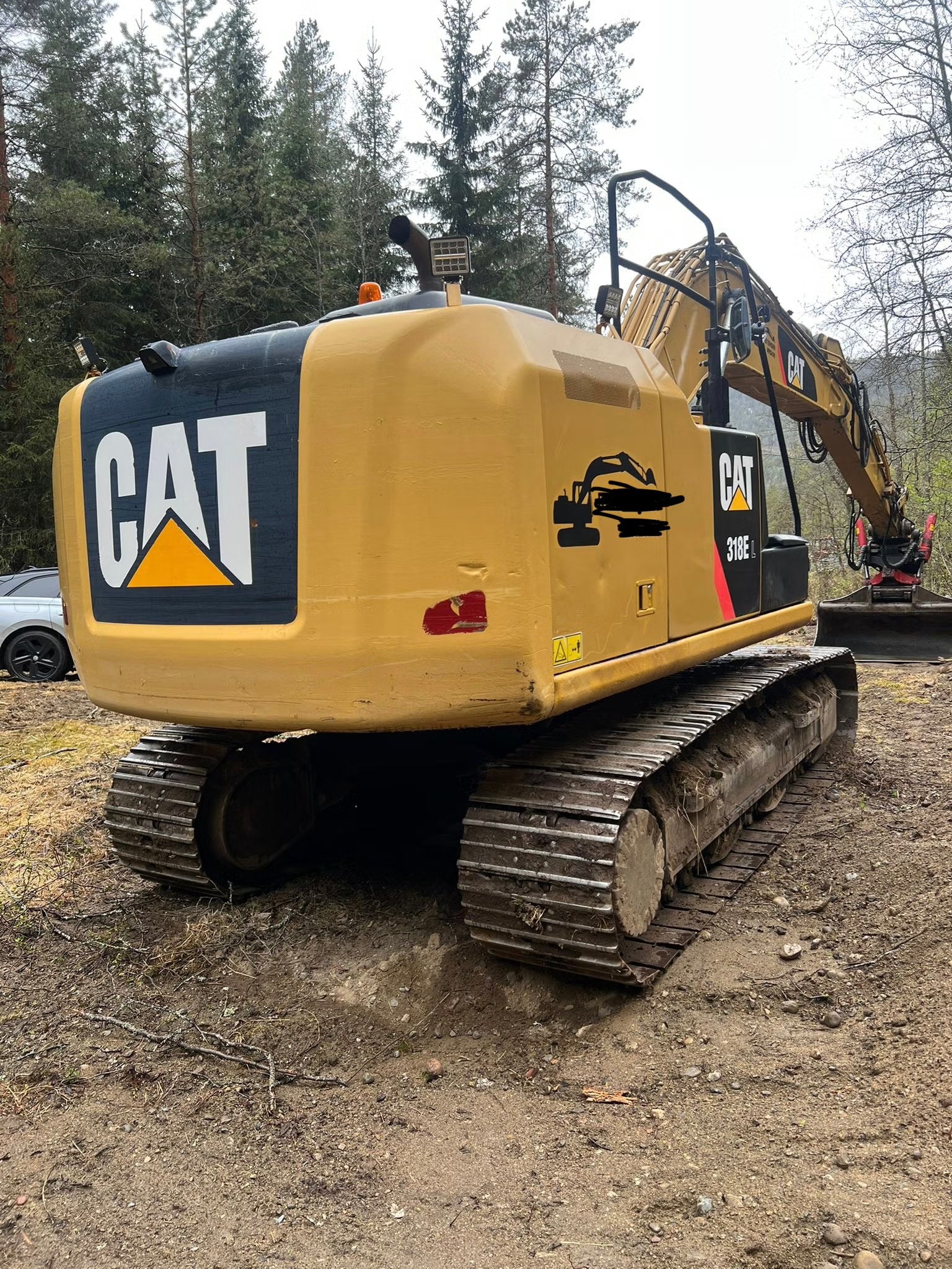 Pelle Cat 318E