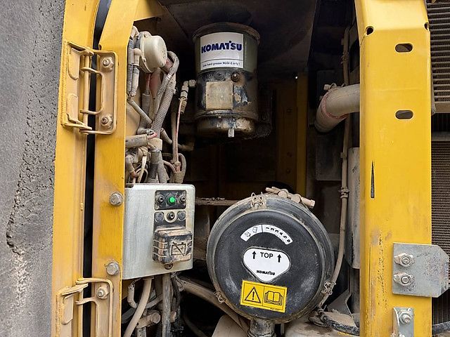 Pelle Komatsu PW180-10 + OilQuick OQ70-55