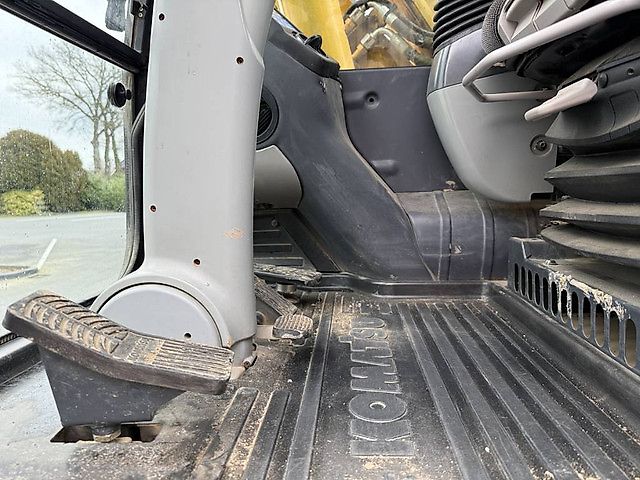 Pelle Komatsu PW180-10 + OilQuick OQ70-55