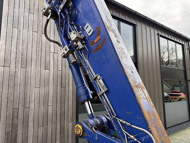 Pelle Komatsu PW180-10 + OilQuick OQ70-55