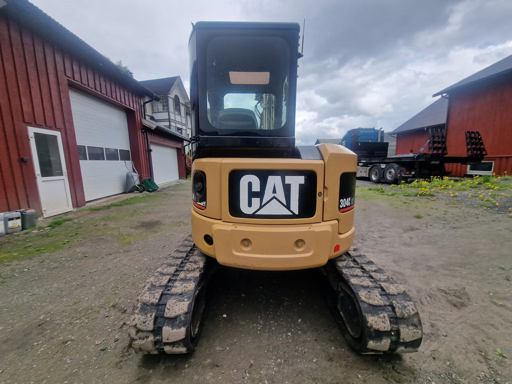 Mini Pelle Cat 304C CR + Godet rotor basculant