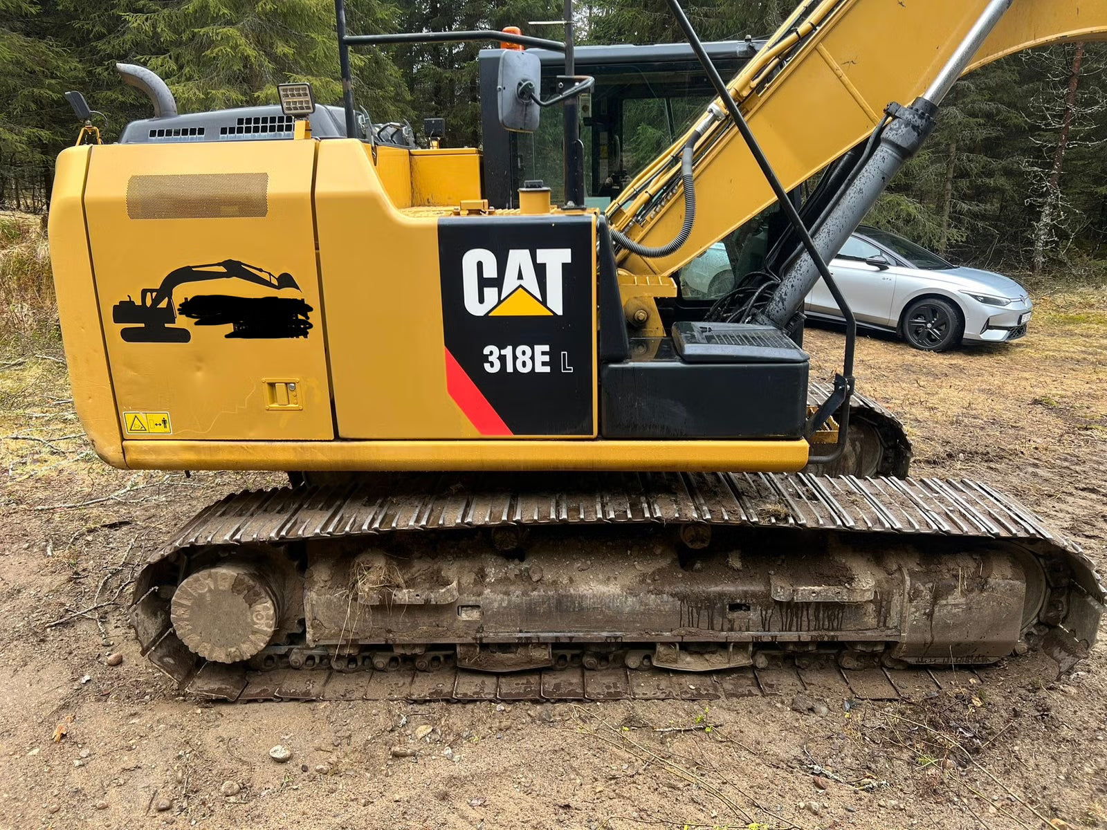 Pelle Cat 318E