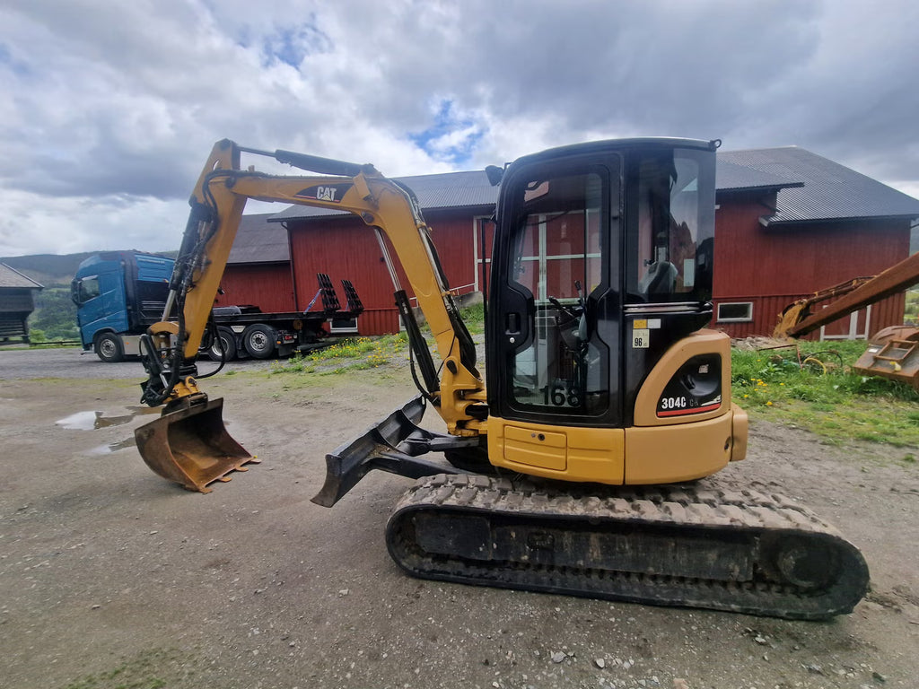 Mini Pelle Cat 304C CR + Godet rotor basculant