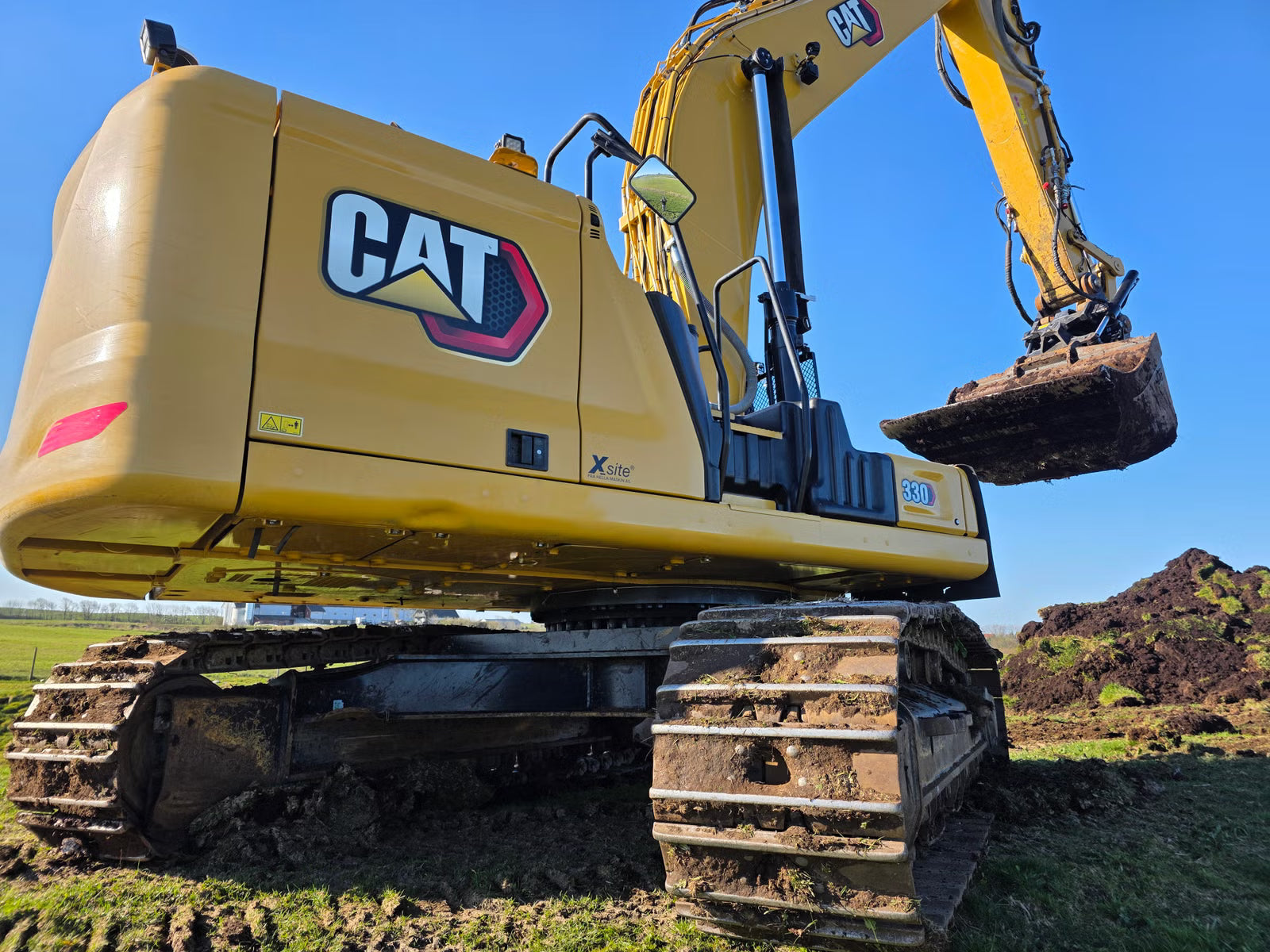 Pelle Cat 330 NG + Radiocommande